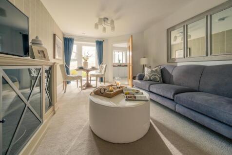a living room with a couch and a table