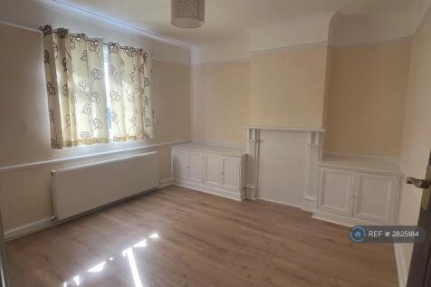 Lounge With Fire Surround And Built In Storage