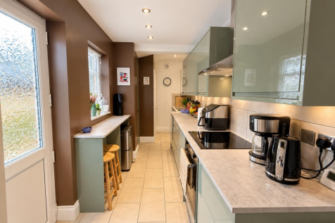 Bright Sage-Green Galley Kitchen Perspective.png