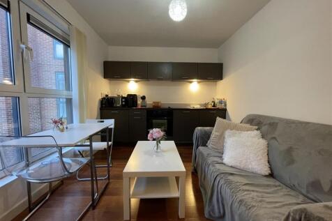 Bright open living space with modern kitchen...