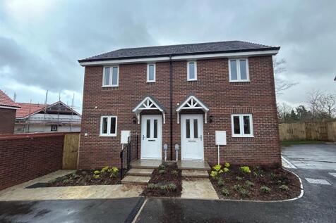 Front Photo is an Image of a Two Bedroom Semi Deta