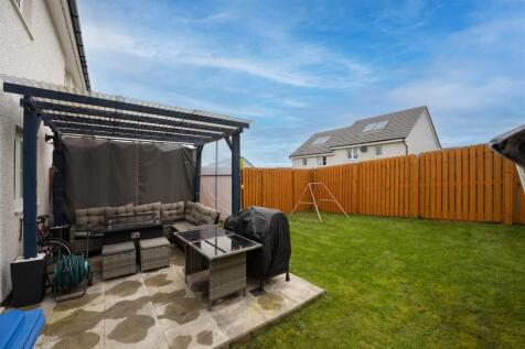 rear enclosed garden - with patio area.jpg
