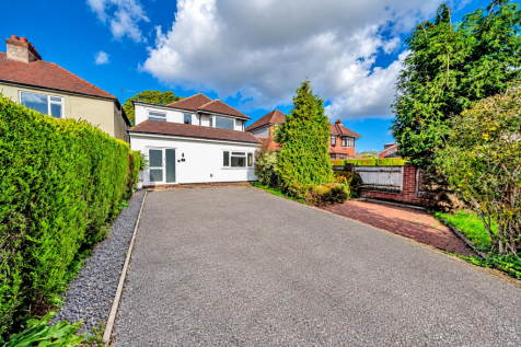 Sunlit Suburban House Driveway (1).png