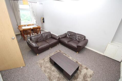 Spacious living area with comfy leather sofas...