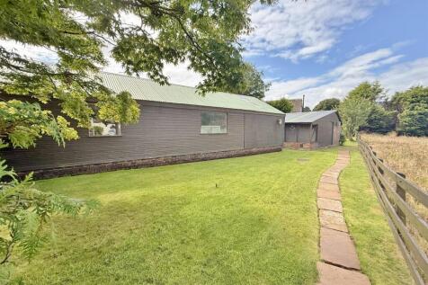 Garage/ workshops and garden