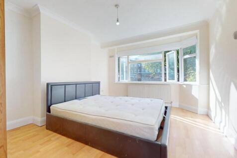 Bright, spacious bedroom with large bay window...