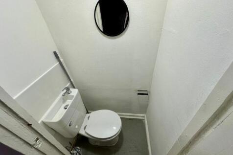 Bright compact WC with modern fixtures...
