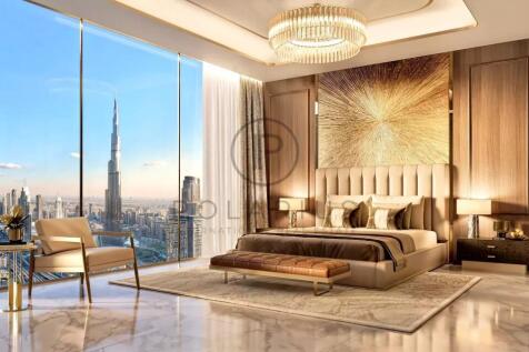 Luxurious bedroom with elegant furnishings, featur