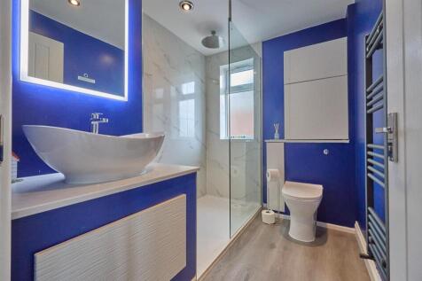 Refitted shower room to side