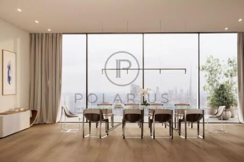 Spacious modern dining room with a large table, el