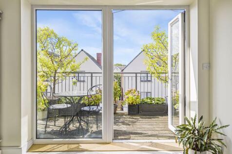 VIEW OF BALCONY VIA LIVING ROOM