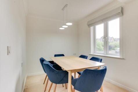 LARGER THAN AVERAGE SITTING AND DINING ROOM