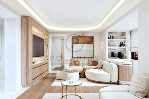 A modern, elegantly designed living room with soft