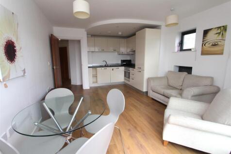 Bright open-plan living with modern dining area...