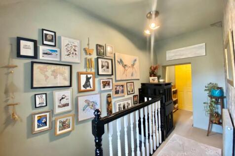 TO THE FIRST FLOOR LANDING