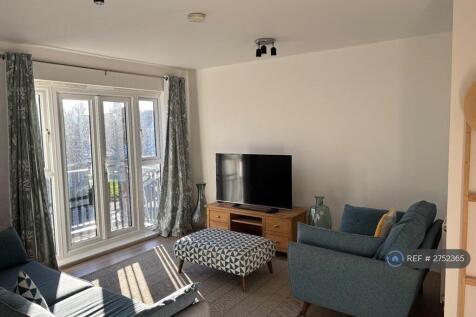 Living Room With Balcony Access