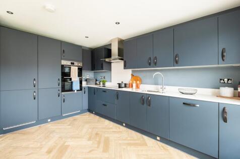 A modern kitchen with ample storage space