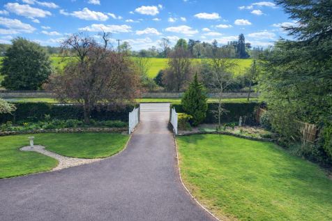 Countryside garden and driveway view.png