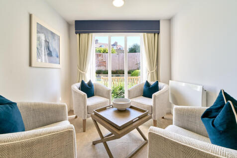 a living room with a couch and a coffee table