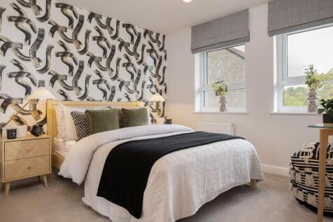 Second bedroom in the Holden 4 bedroom detached home