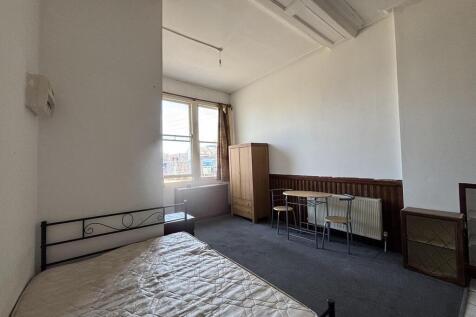 Spacious bedroom with ample natural light...
