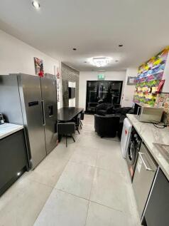 Modern open-plan kitchen with spacious layout...