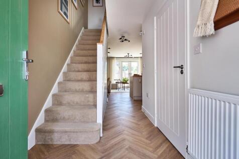 Spacious and bright hallway with views through to the garden