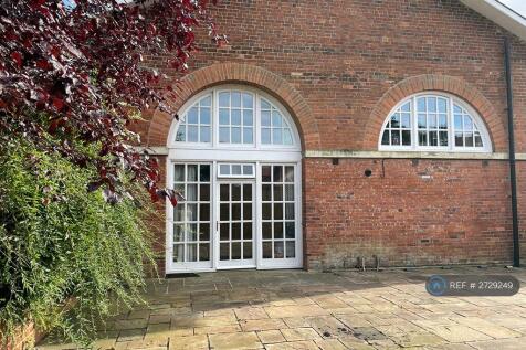 Entrance Through Double Height Archway