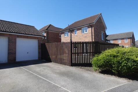 Driveway to Single Garage at the Rear