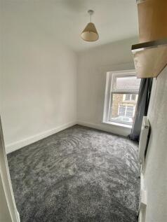Bright bedroom with fresh grey carpets...