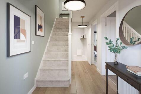 Bright hallway and convenient cloakroom