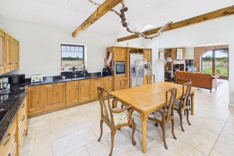 Annex dining kitchen through to lounge