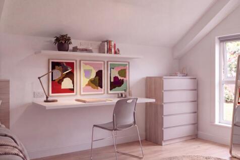 Bright workspace with modern desk and decor...