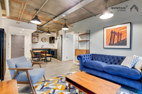 Blue sofa and modern kitchen.png