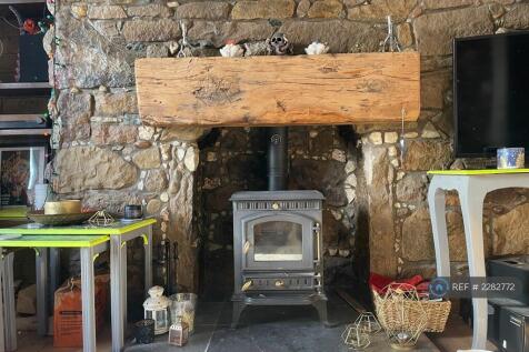 Log Burning Stove In The Living Room