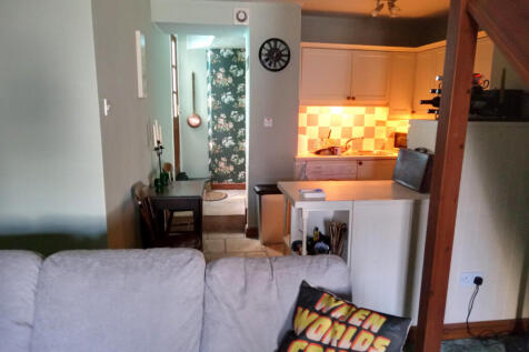 Lounge going into kitchen