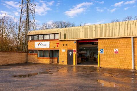 Rainbow Carpets &amp; Flooring warehouse at sunset.jpg