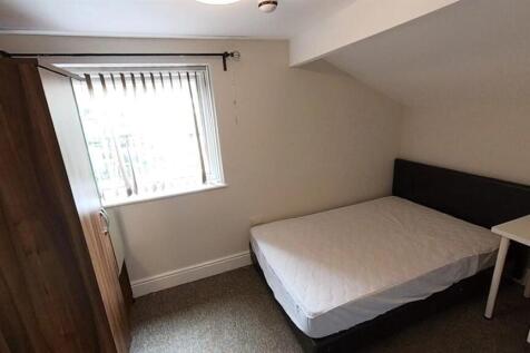 Bright double bedroom with ample storage space...