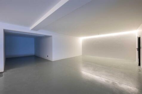 garage with extra space for creating alternate use areas 