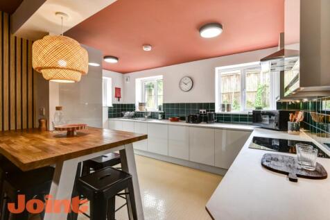 Modern kitchen with chic breakfast bar area...
