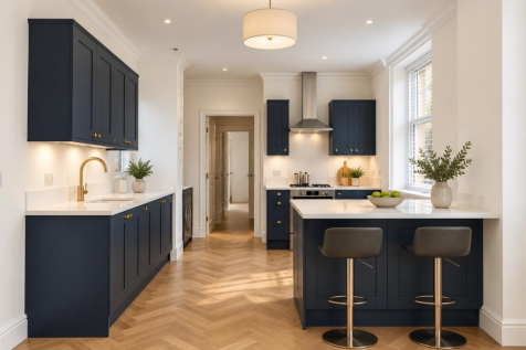 Sunlit Navy Shaker Kitchen with Brass Accents.png
