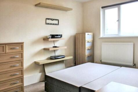 Bright bedroom with ample storage space...