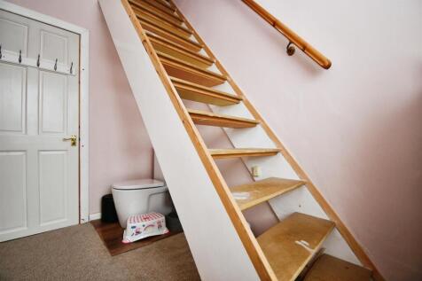 Bedroom three / cloakroom