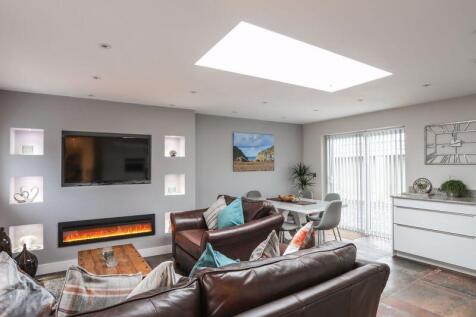 open plan lounge dining room and kitchen