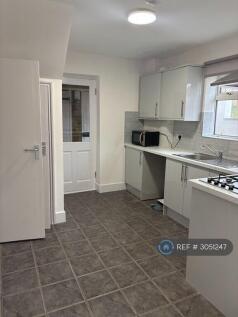 Kitchen  With Door To Covered Outbuildings
