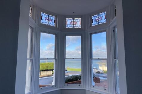 Bright bay window with stunning sea views...