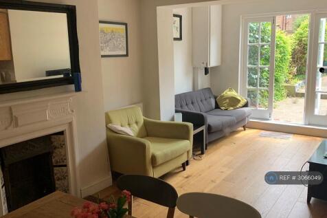 Dining And Lounge Areas On Garden