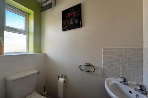 Bright and clean separate WC with a window...