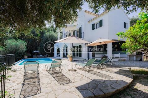 Pool terrace and house