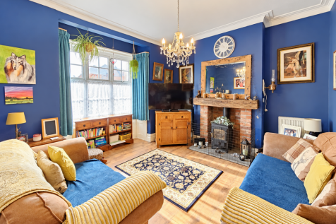 Cozy Blue-Walled Traditional Living Room
